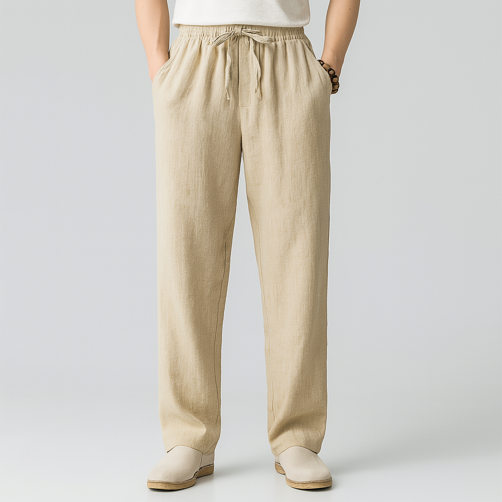 Beige linen drawstring pants with elastic waist and relaxed fit — front view