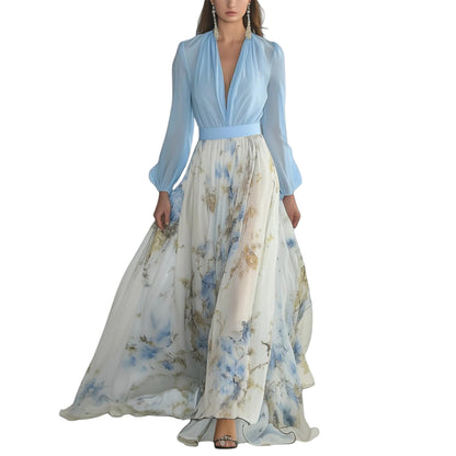 Floral print maxi dress with blue bodice and flowing cream skirt with blue floral pattern — front view