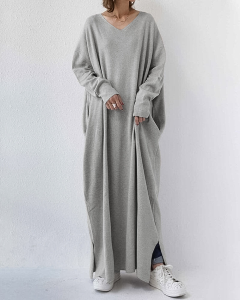 Women's oversized gray maxi dress with V-neck and side slits — front view