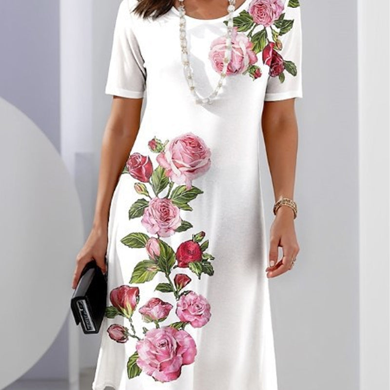 White midi dress with pink and red rose floral print — front view