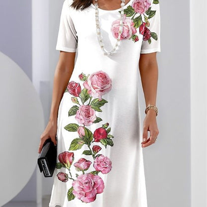 White midi dress with pink and red rose floral print — front view