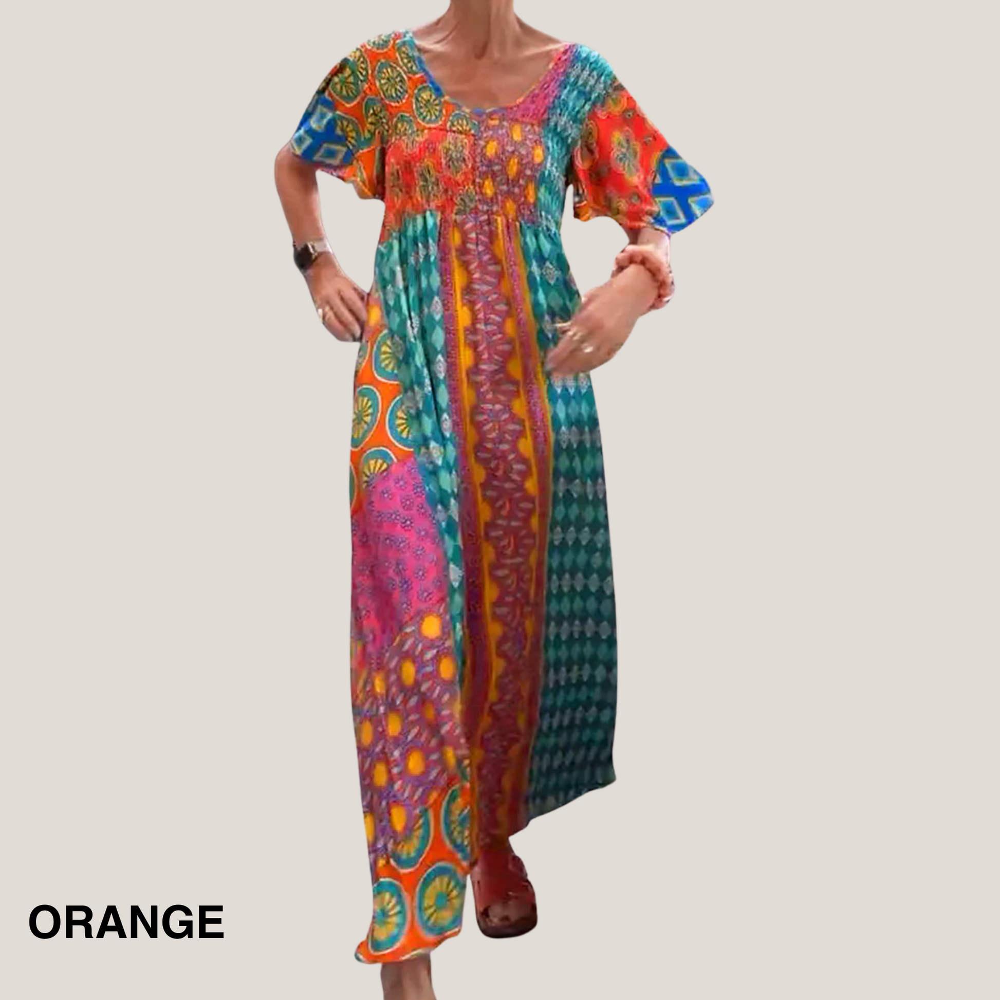 Colorful patchwork paisley midi dress with short sleeves and empire waist — front view