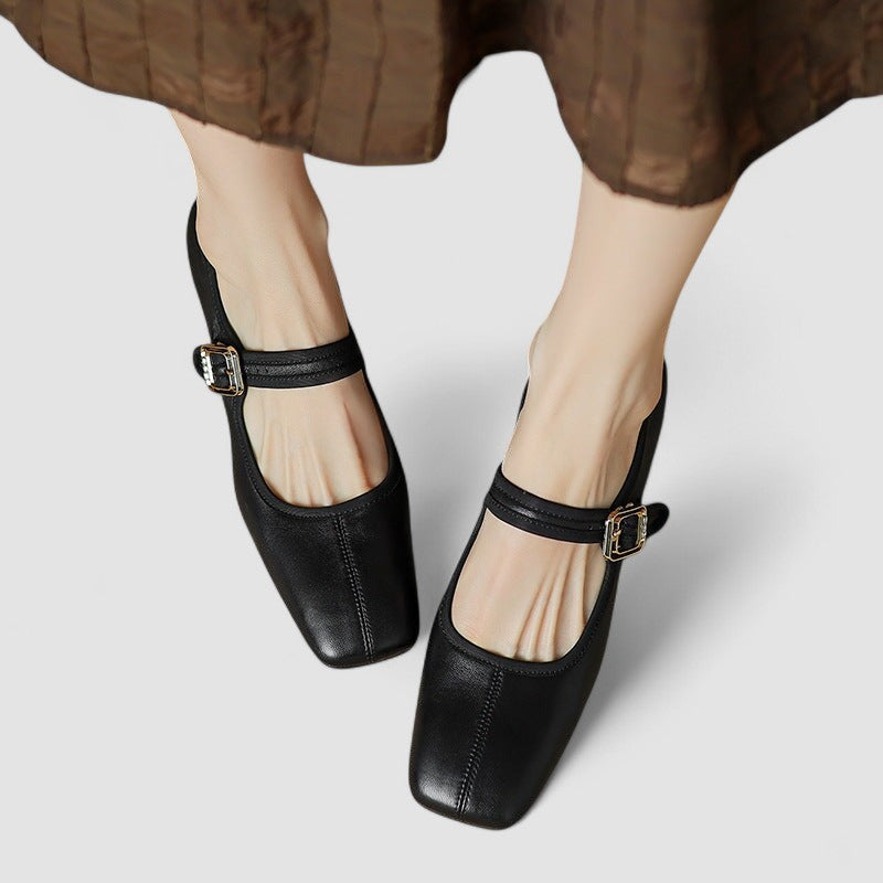 Black leather Mary Jane shoes with ankle strap and square toe — top-down view