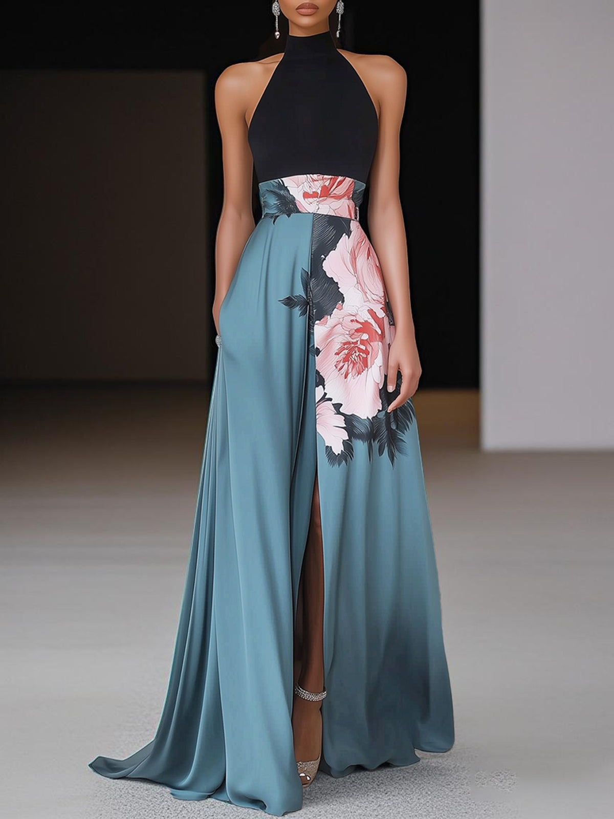 Halter neck maxi dress with floral print and high slit in teal and black — front view