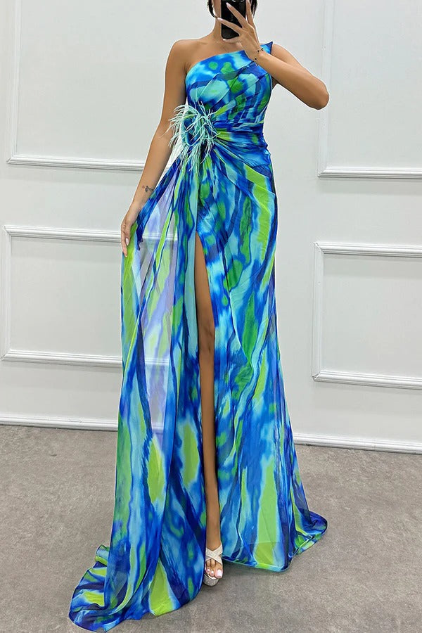 Vibrant blue and green tie-dye one-shoulder maxi dress with high slit — front view