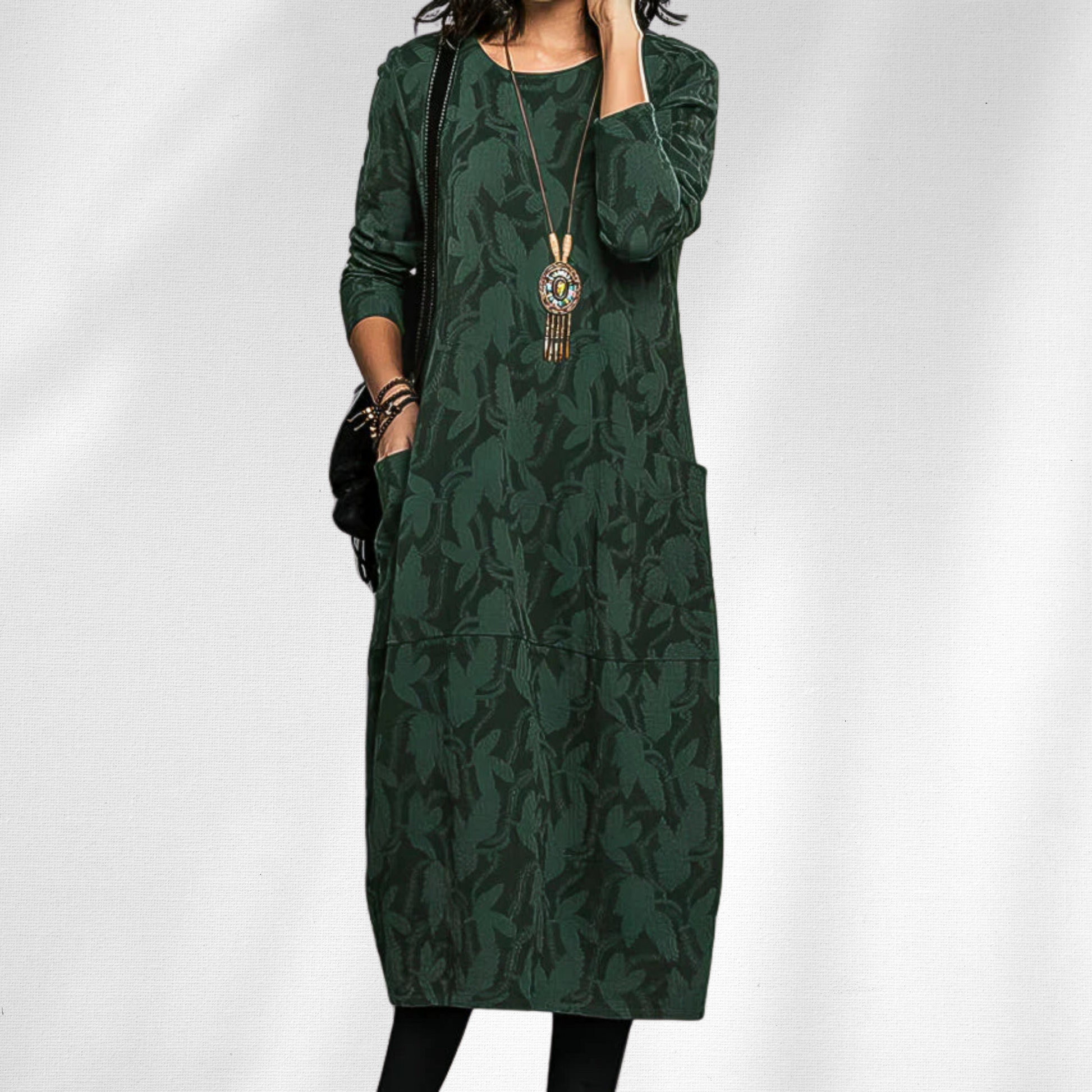 Dark green floral jacquard knit midi dress with long sleeves and pockets — front view