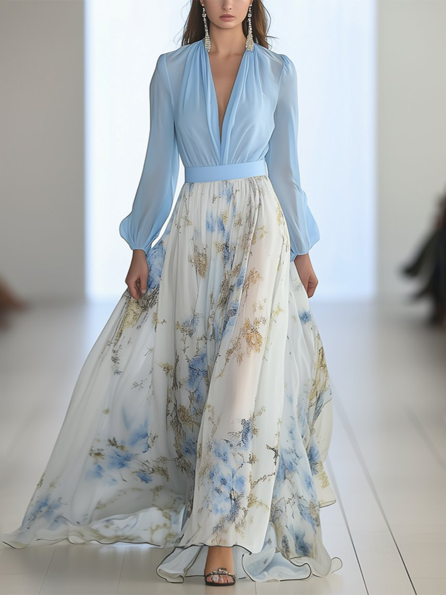 Flowing maxi dress with light blue bodice and floral print skirt — front view