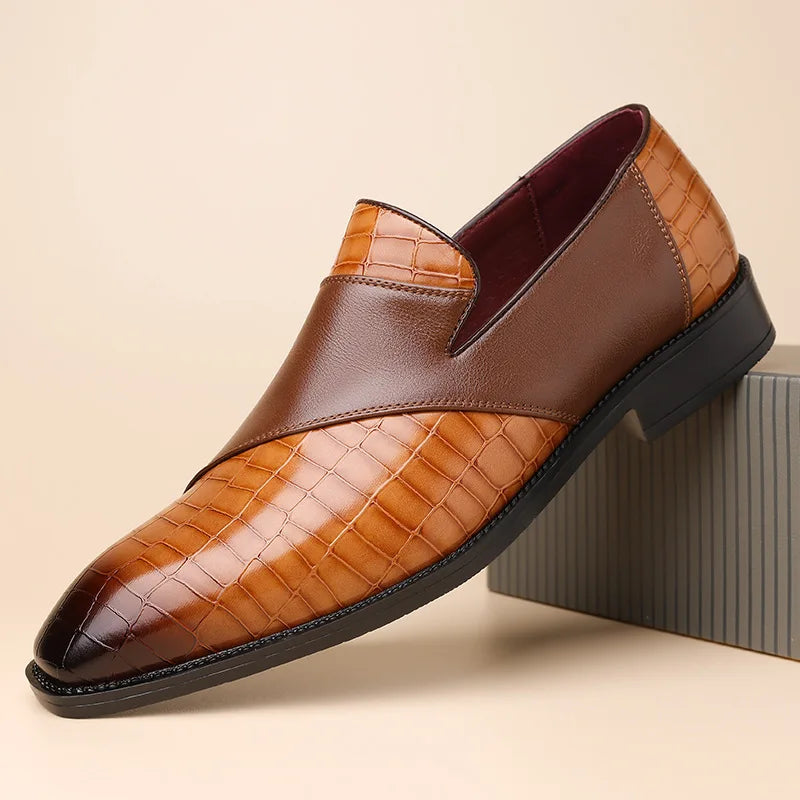 Men's brown crocodile-textured leather loafers with smooth leather band detail — angled side view
