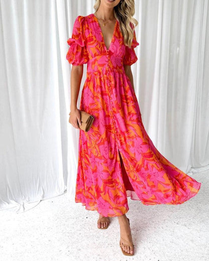 Women's pink and orange floral maxi dress with ruffled sleeves and V-neckline — front view
