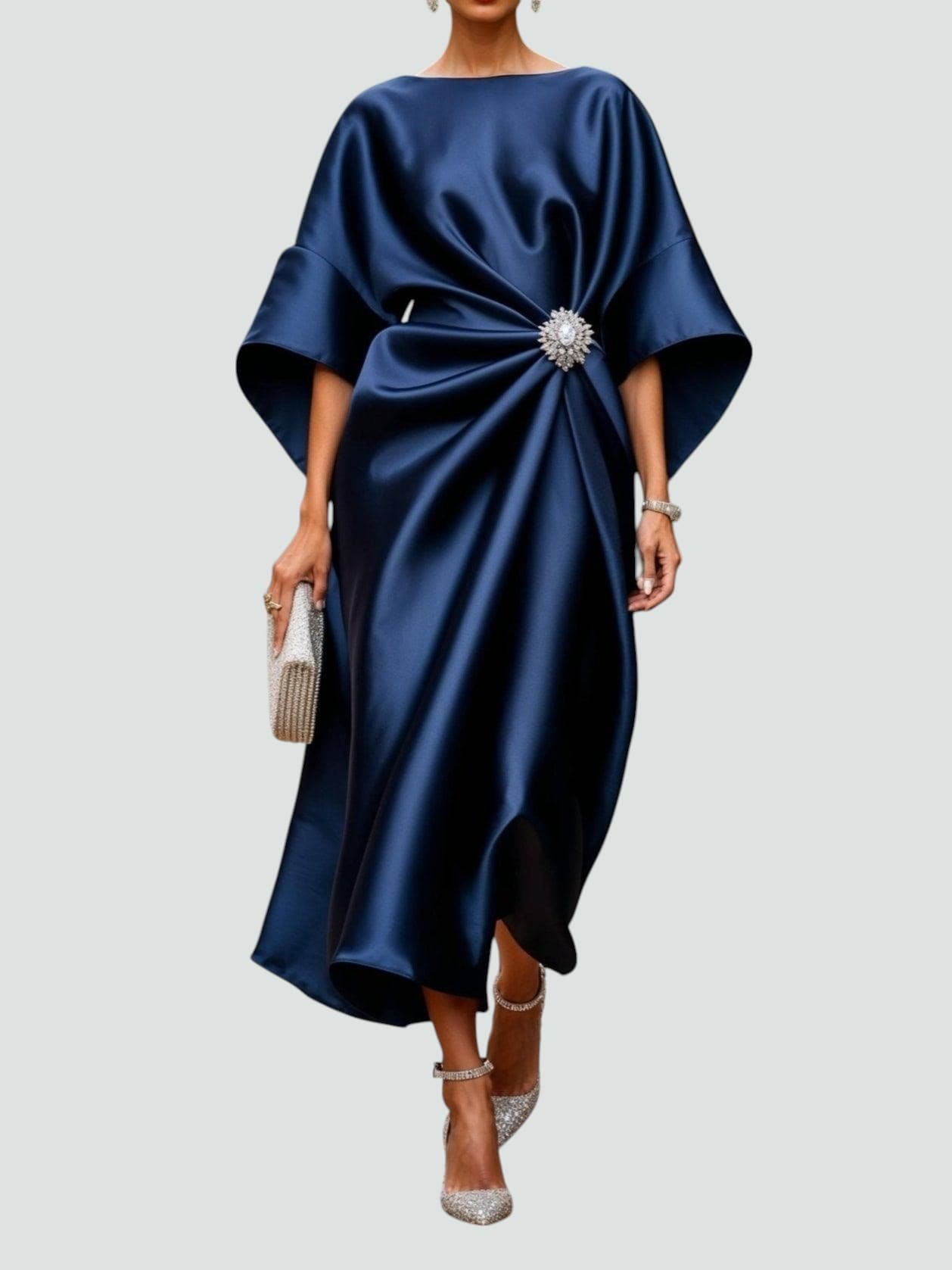 Navy blue satin evening maxi dress with crystal brooch waist detail and kimono sleeves — front view