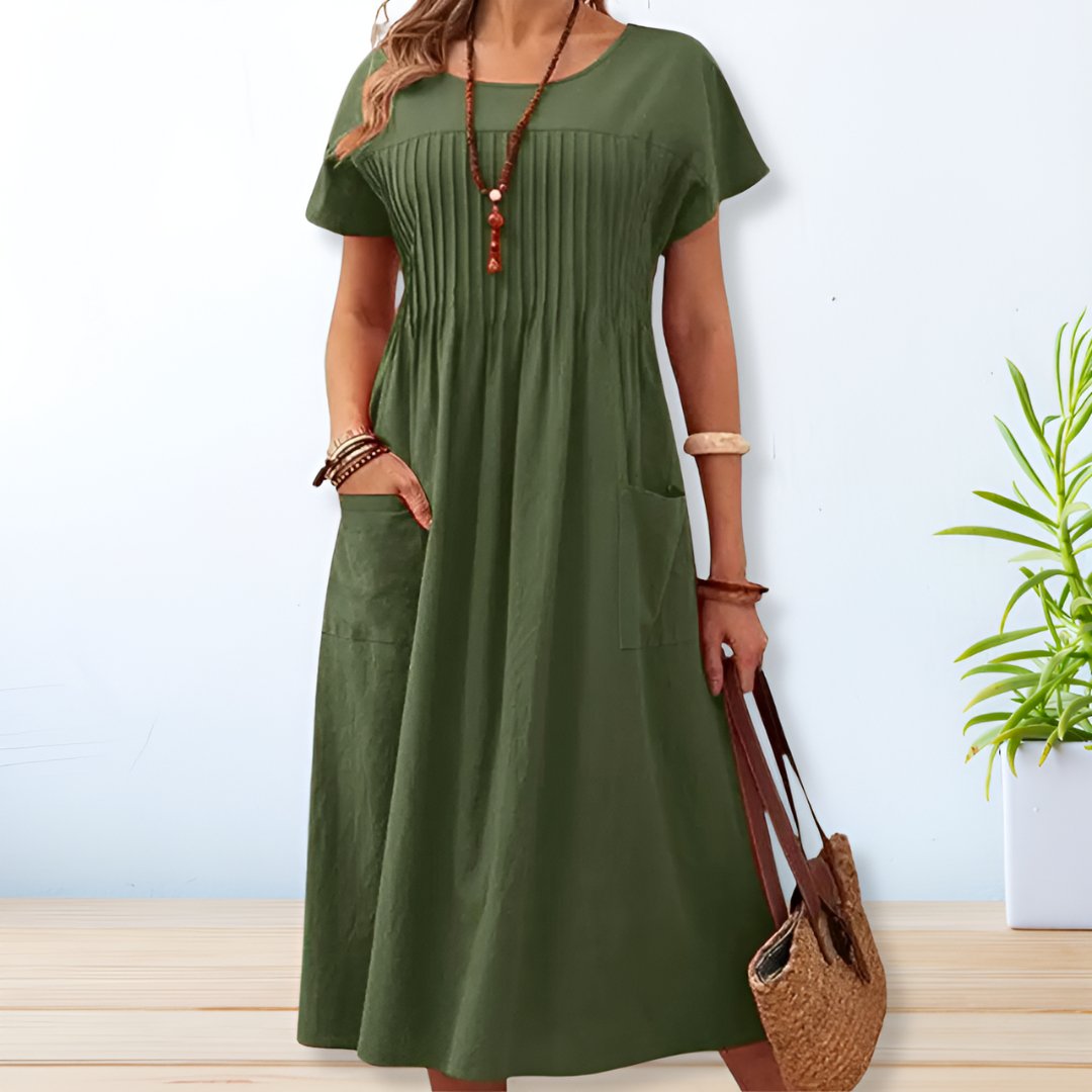 Olive green midi dress with pleated front detail and side pockets — front view