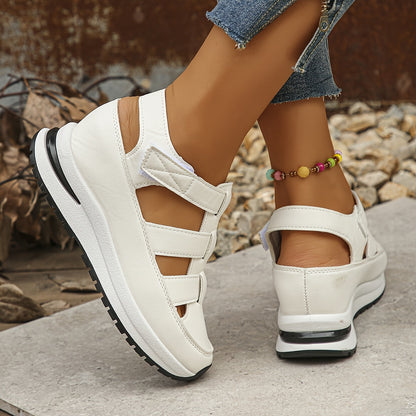 White platform sandals with adjustable straps and colorful ankle bracelet — side view