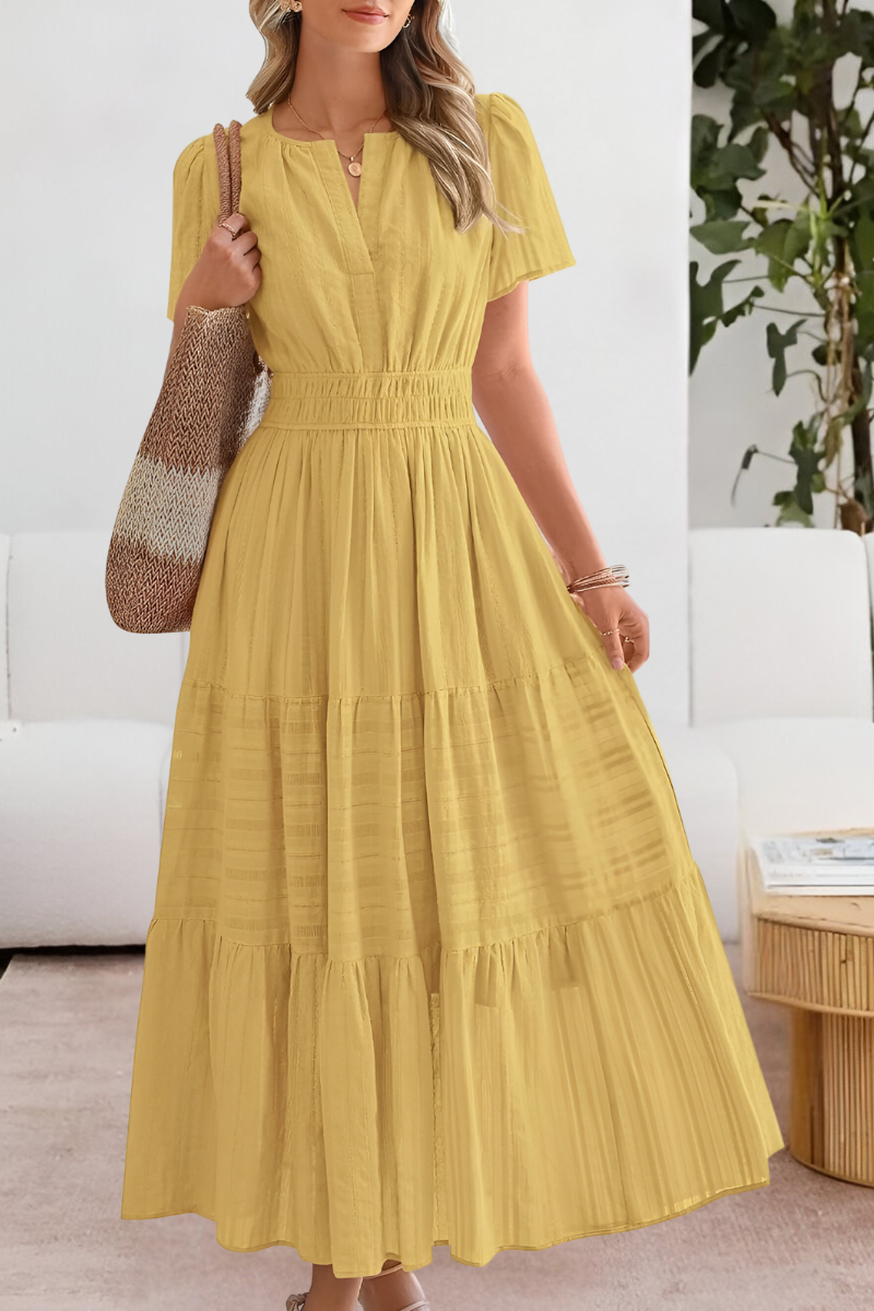 Yellow tiered boho midi dress with short sleeves and smocked waist — front view