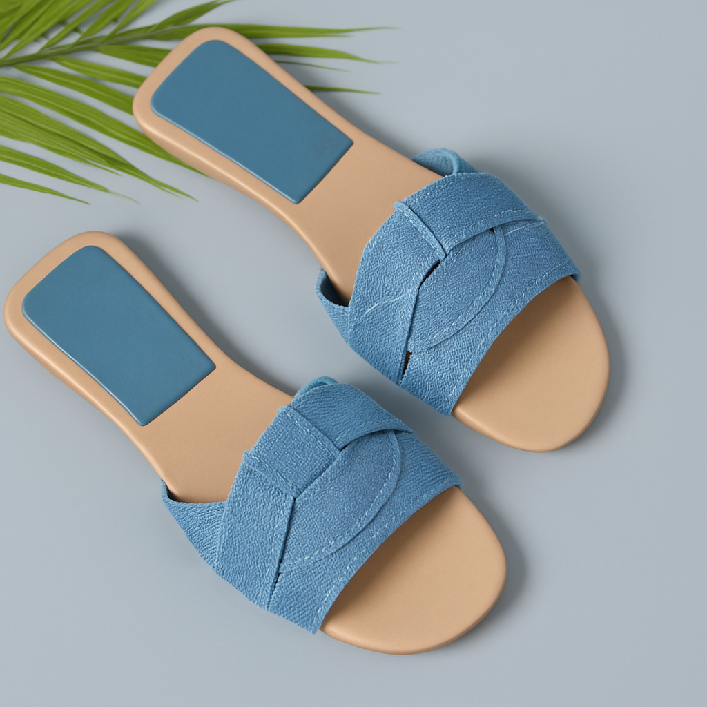 Blue braided strap slide sandals with tan footbed and matching insole — overhead flat lay view