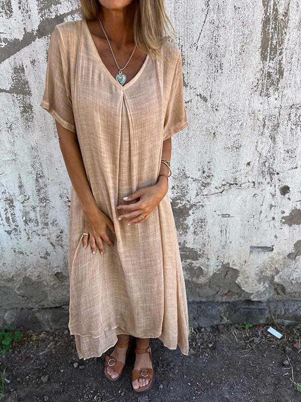 Women's beige v-neck midi dress with short sleeves and relaxed fit — front view