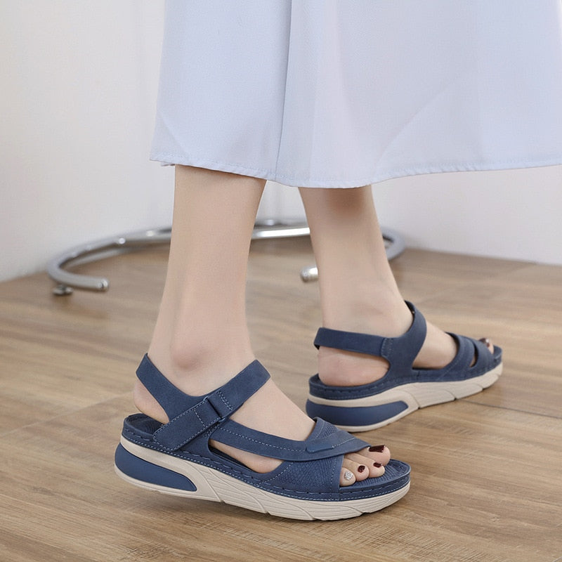 Women's navy blue orthopedic sandals with adjustable straps and cushioned sole — side view