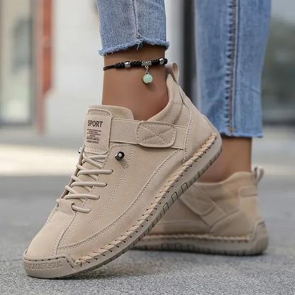 Beige orthopedic sneakers with velcro strap and lace-up design — side angle view