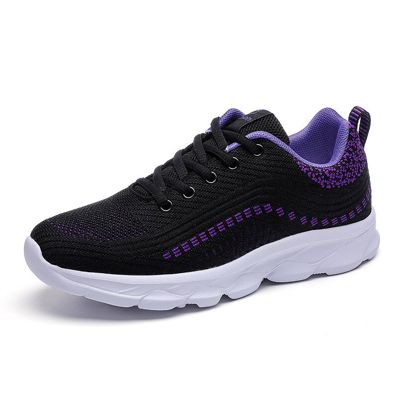 Black and purple women's orthopedic walking sneaker with white chunky sole — side view