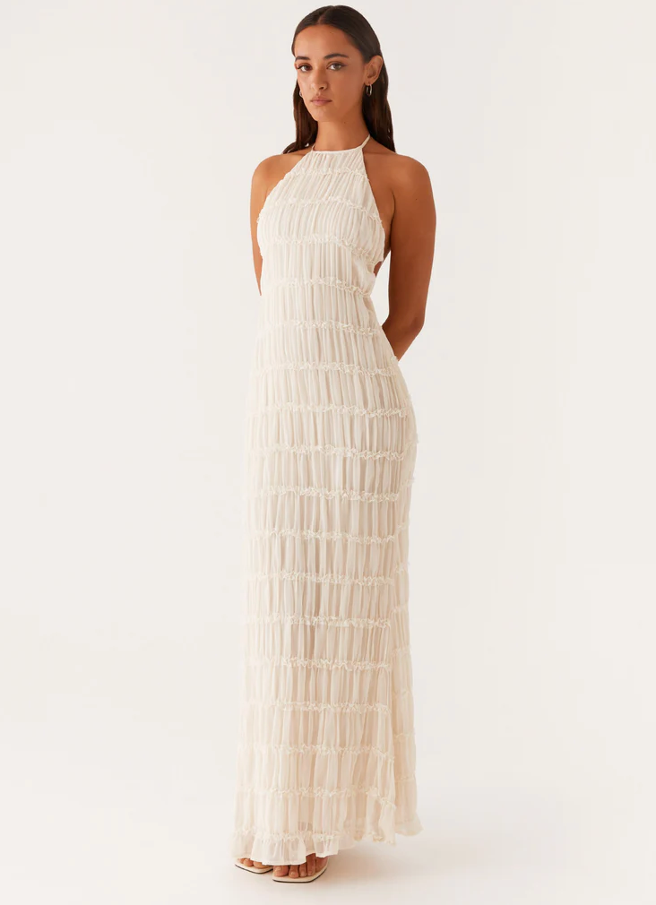 White textured halter maxi dress with tiered fringe detail — front view