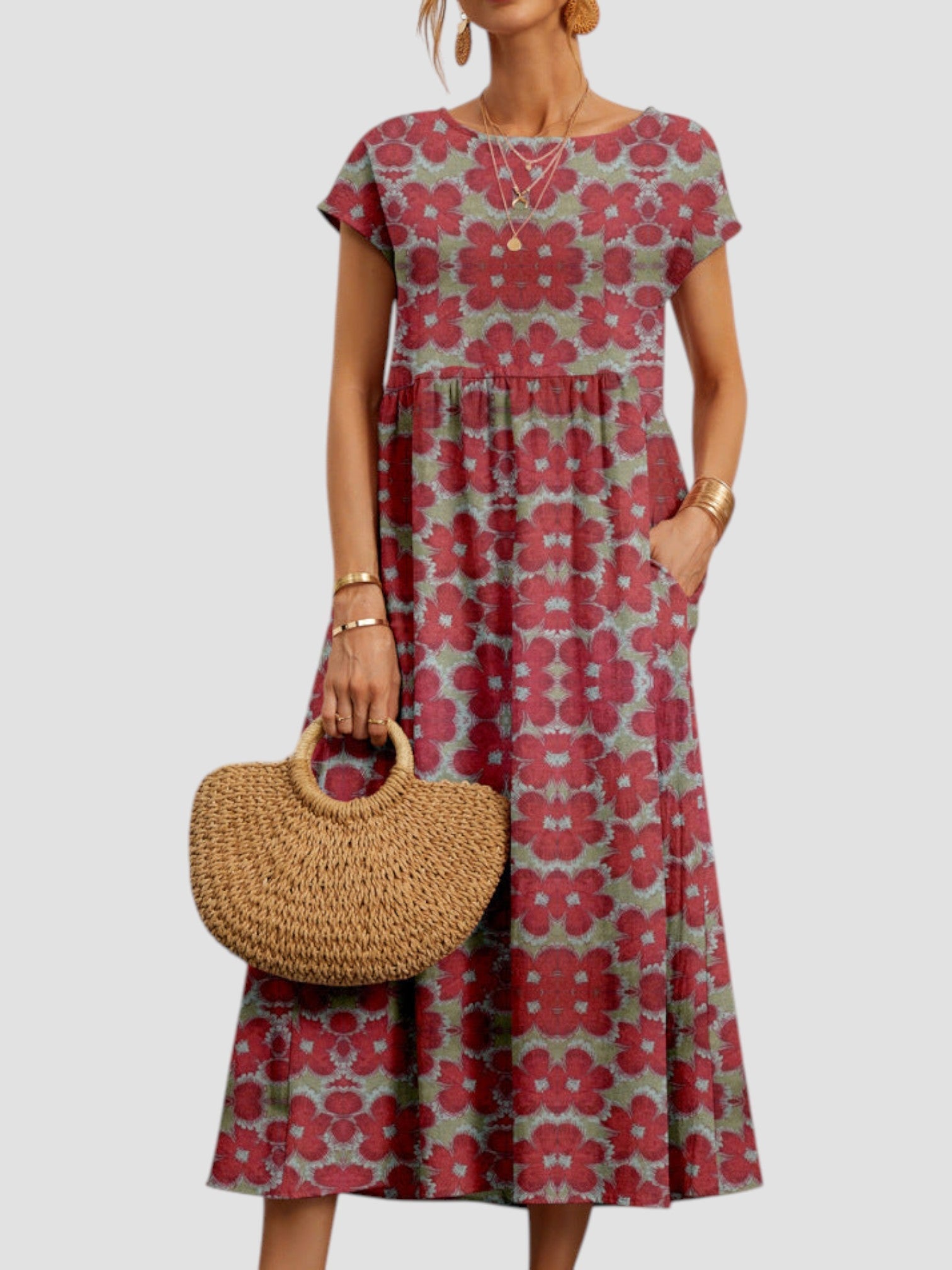 Floral print tiered maxi dress with short sleeves and pockets — front view