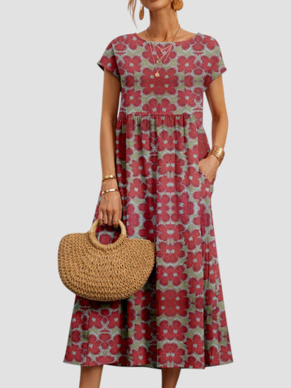Floral print tiered maxi dress with short sleeves and pockets — front view