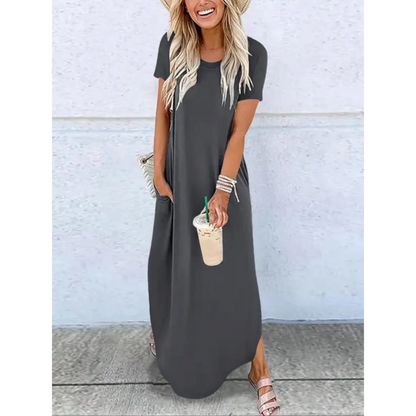 Women's dark gray short sleeve maxi dress with side pockets and slit — full length front view