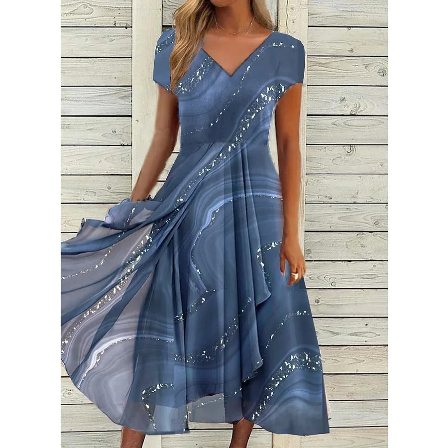 Blue midi dress with diagonal silver sequin stripes and flowing skirt — front view