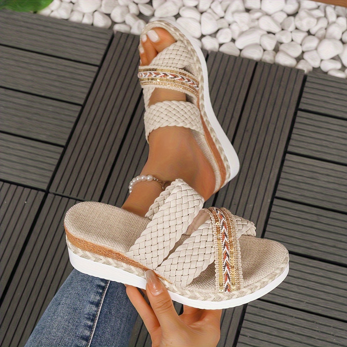 Beige woven slip-on sandals with embellished straps and platform sole — angled side view