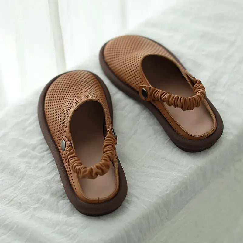 Women's brown mesh cushioned flat sandals with elastic straps — overhead view