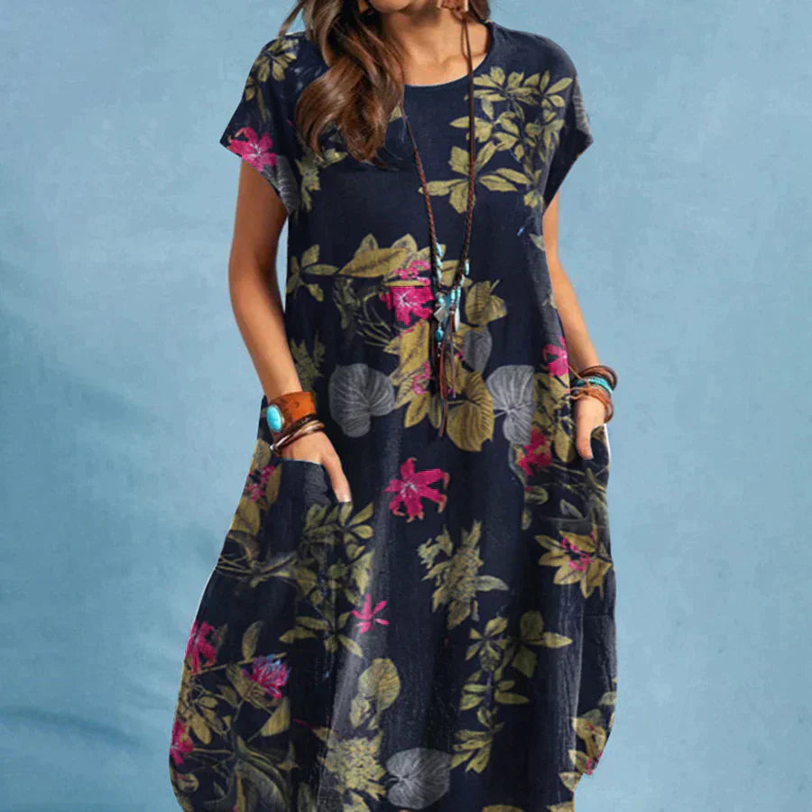 Floral print midi dress with short sleeves and pockets in navy blue — front view