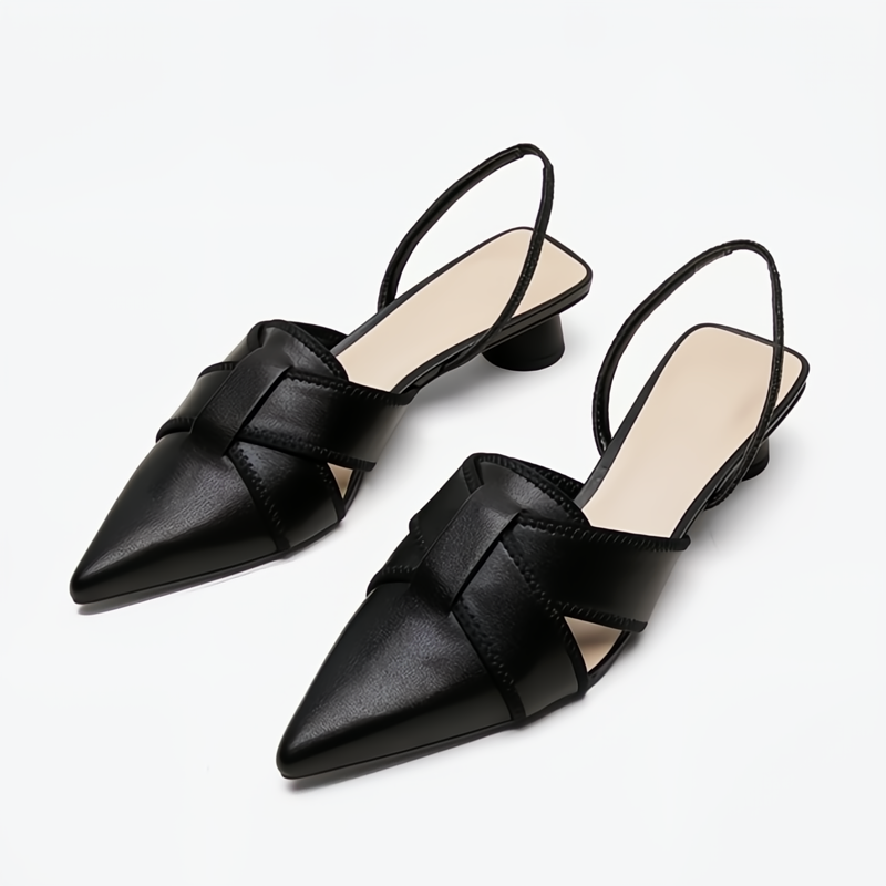 Black pointed-toe slingback sandals with woven leather detail — elevated three-quarter view