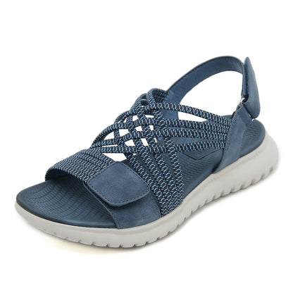 Blue orthopedic sandal with braided straps and white sole — side view