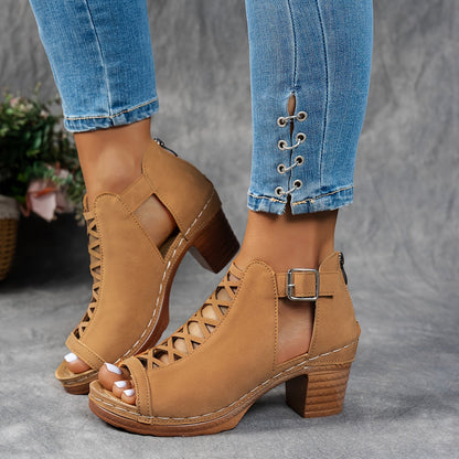 Women's tan lattice cutout heel sandals with ankle buckle strap on model wearing jeans — side view