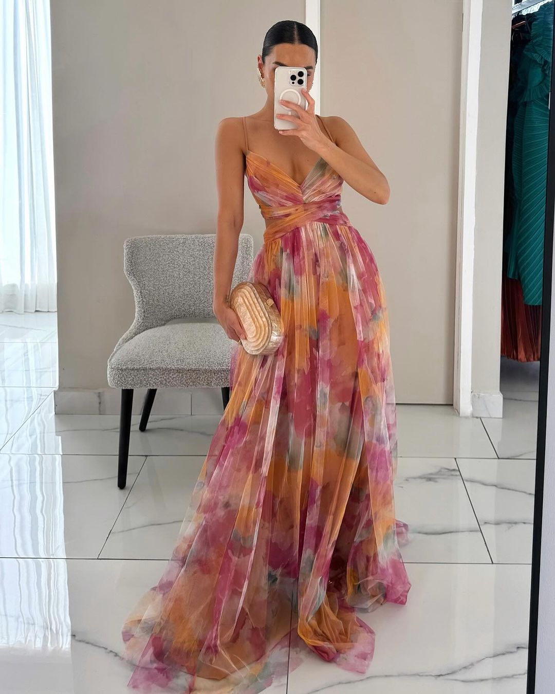 Floral print maxi dress with pink and orange watercolor pattern and wrap bodice — front view
