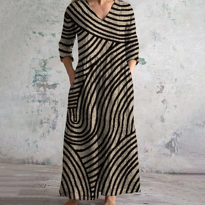 Women's vintage striped midi dress with curved line pattern and three-quarter sleeves — front view