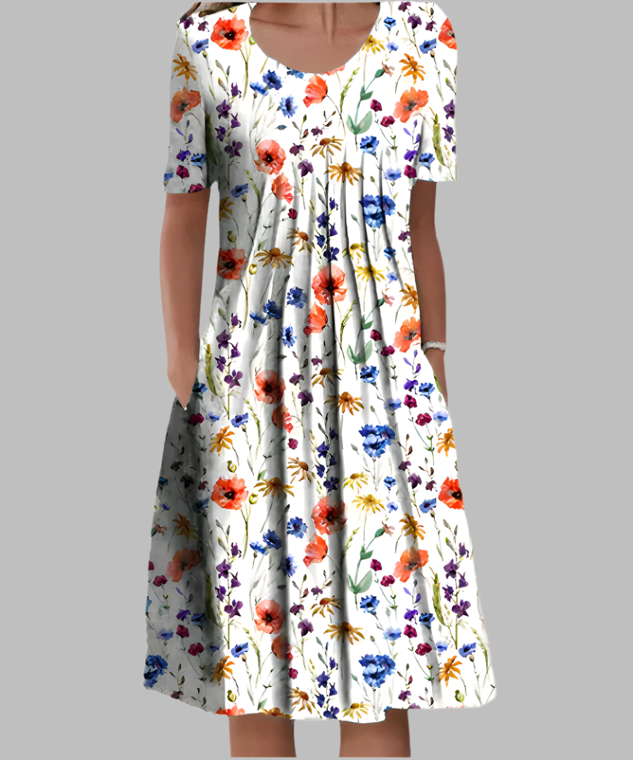 Floral print midi dress with colorful wildflower pattern on white background — front view