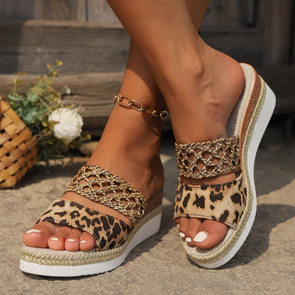 Leopard print wedge sandals with gold woven straps and espadrille platform — side view