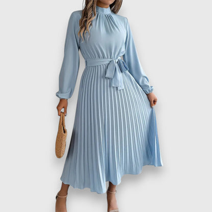 Light blue pleated midi dress with mock neck and tie waist belt — front view