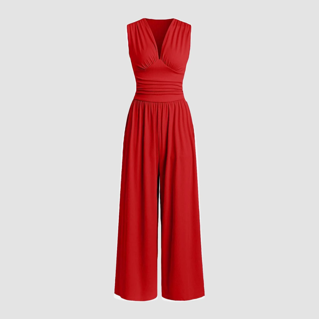 Red sleeveless V-neck jumpsuit with ruched waist and wide-leg pants — front view