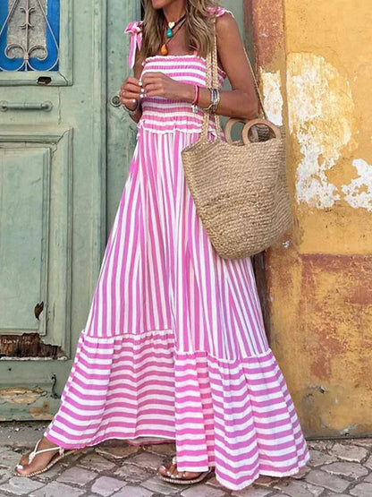 Pink and white striped maxi dress with ruffled tiers and shoulder ties — front view