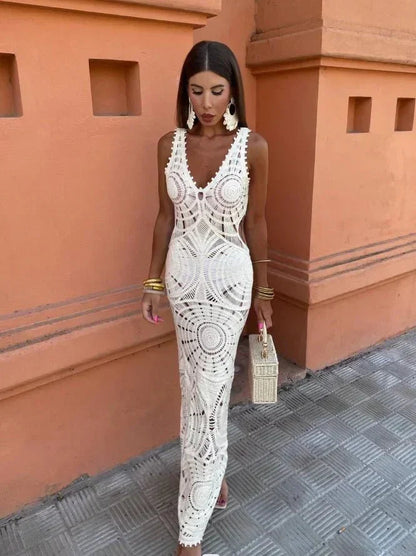 White crochet lace maxi dress with deep V-neck and geometric pattern — front view