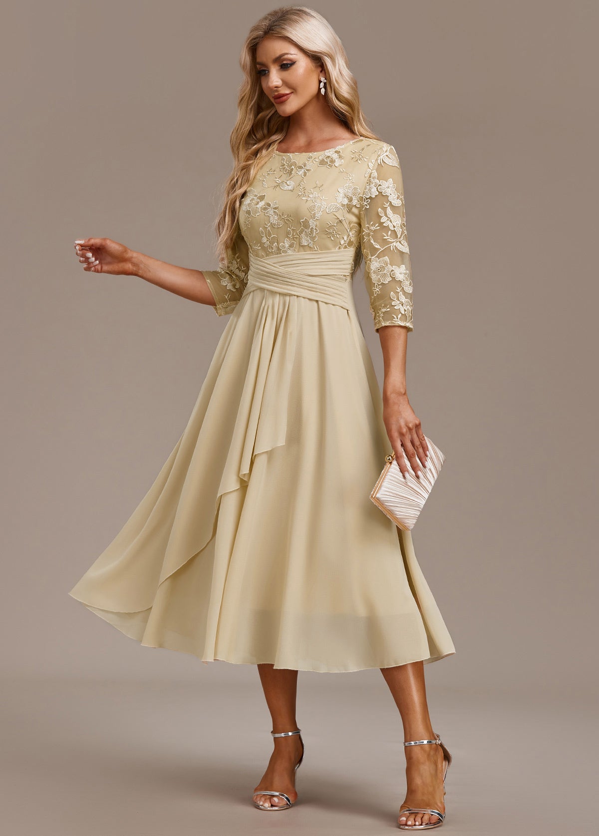 Champagne midi dress with floral lace bodice and pleated waist sash — front view