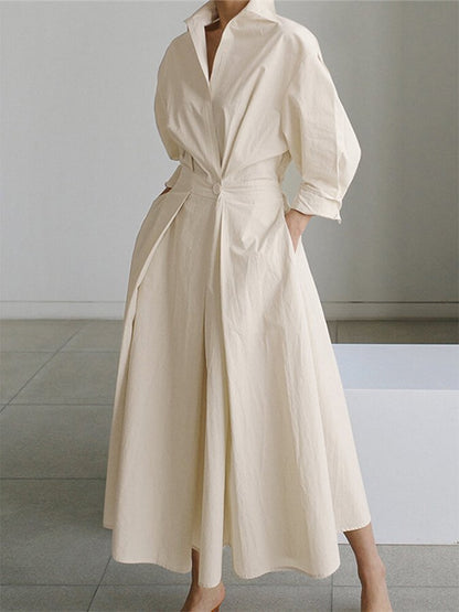 Cream belted shirt maxi dress with full skirt and collar — front three-quarter view