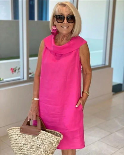 Hot pink linen sleeveless midi dress with cowl neckline and side pockets — front view