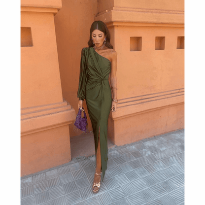 Olive green one-shoulder maxi dress with draped sleeve and twisted waist detail — full length front view